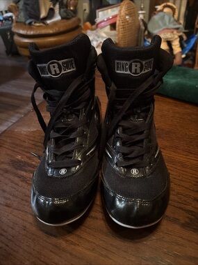 Ring side men’s size 11 boxing shoes white and black size label close-up